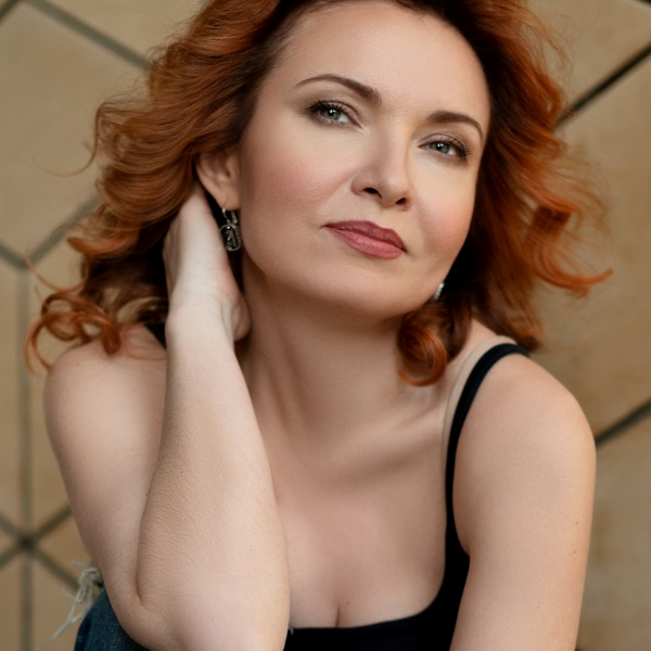 redhead woman posing for the camera